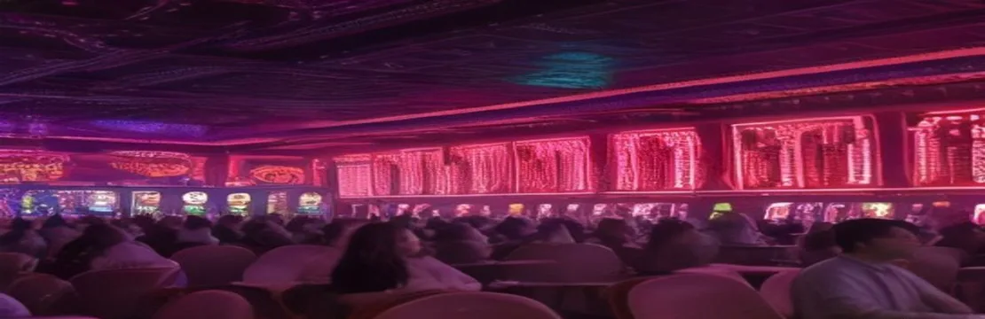 crowded casino floor with people playing slot machines